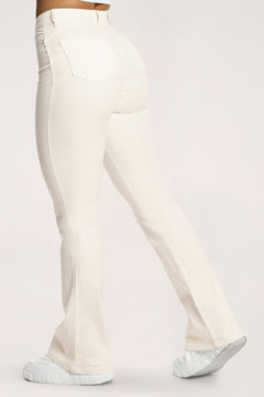 Blugi evazați perfect slim off white